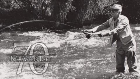 Photo of Ken McAfee fishing in river
