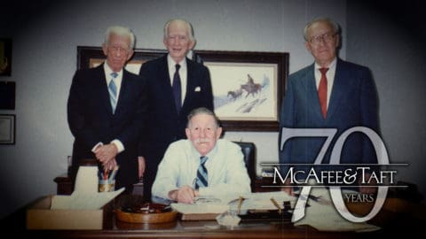 Photo of firm founders Kenneth McAfee and Richard Taft with early-years leaders "Colonel" Joseph Rucks and Stewart Mark