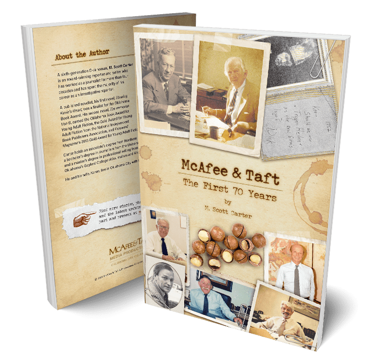Photo of the front and back covers of the commemorative book, McAfee & Taft: The First 70 Years