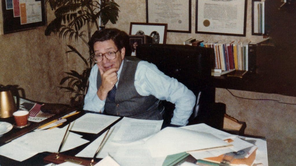 John Mee at his desk, date unknown.