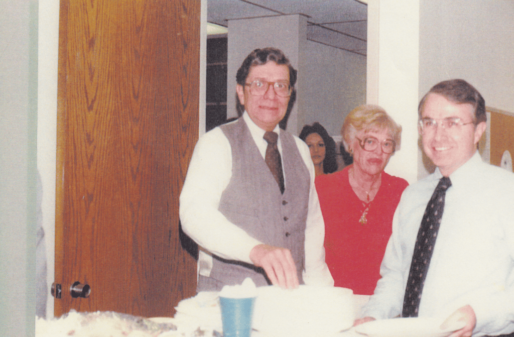 Photo of John Mee (left) and Gary Fuller (right) at a firm luncheon.